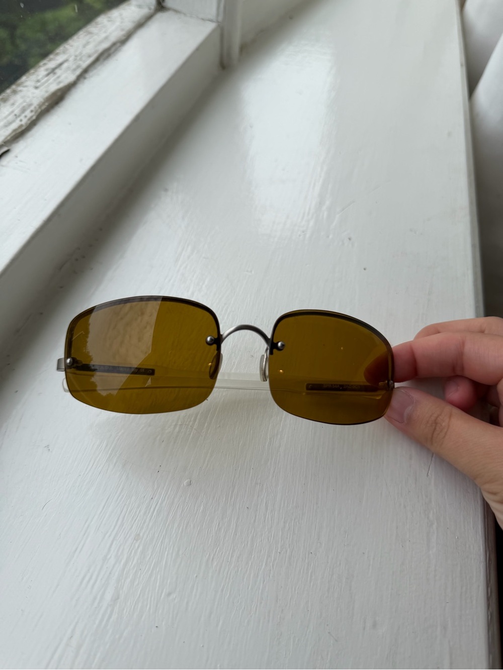 Prada Women's Rimless Rectangle Sunglasses in Amber Lenses with Thin Metal Frame - Picture 6 of 6
